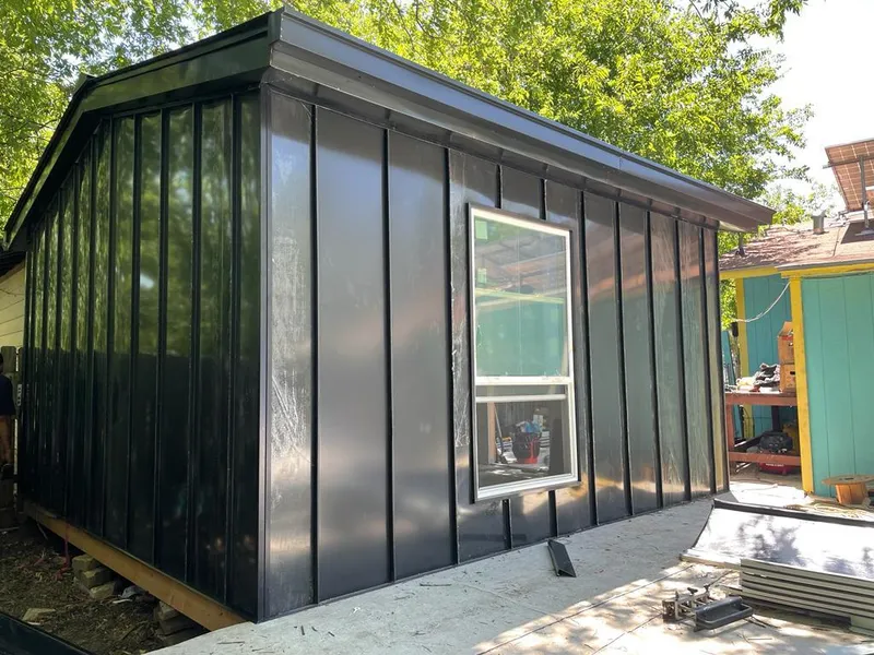 Black standing seam metal wall panels for Roof Inspection in Vestavia Hills